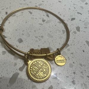 New without tags Alex and Ani gold charm born to be something bracelet